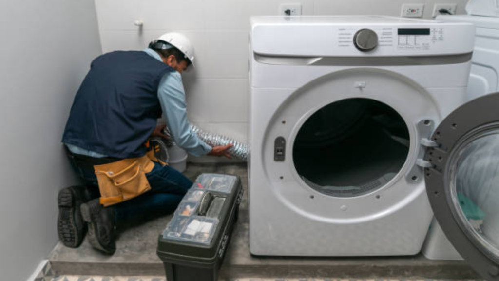 Dryer Repair Abilene TX | Same-Day Fix for Not Heating or Tumbling Near You 6 Dryer Repair Abilene Tx, technician fixing dryer